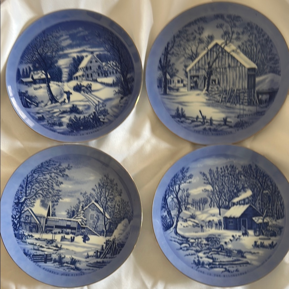 Set of Four Blue and White Decorative Plates